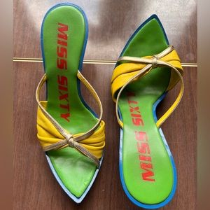 Miss sixty one of a kind mules!